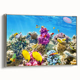 Landscape art painting of the Great Barrier Reef on a framed canvas, featuring vibrant blue and green tones.