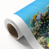 Art Deco poster of the Great Barrier Reef in vibrant blues and greens on rolled canvas, ideal for nursery wall art.
