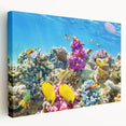 Large art print on canvas depicting the Great Barrier Reef in vivid blue and green tones, suitable for kitchen wall art.
