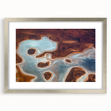 Abstract art print of Queensland scenery in muted earth tones on a framed silver mat, ideal for dining room decor.