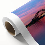 Art deco poster of Sydney skyline in pastel shades on rolled canvas, ideal for nursery wall art.