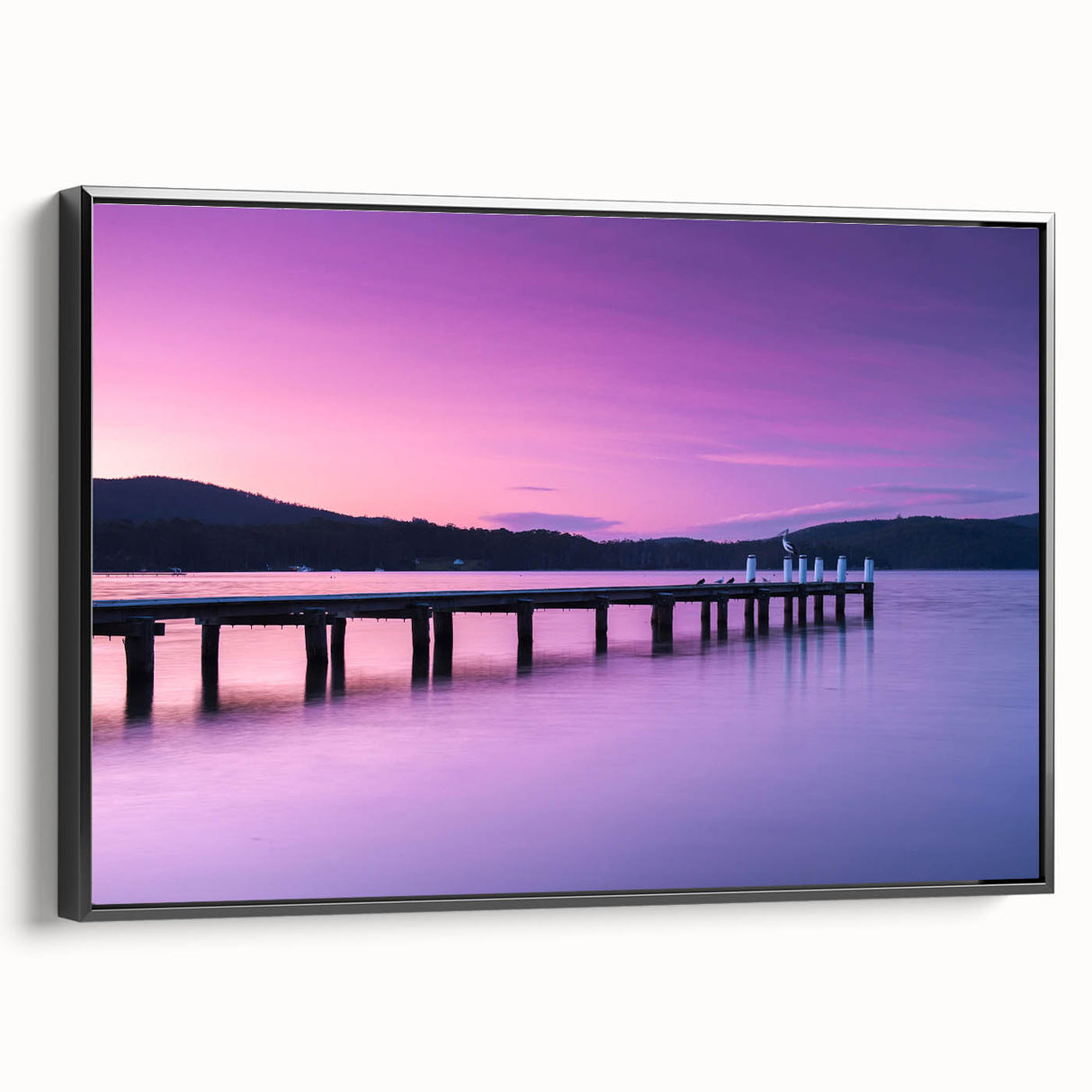 Black and white framed canvas depicting a serene Tasmanian landscape, ideal for bedroom wall decor.