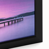 Close-up of a framed canvas featuring a textured Tasmanian landscape in black with vibrant color accents.