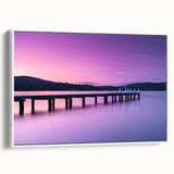 Framed canvas featuring a vintage-style landscape painting of Tasmania with vibrant colors on a black background.