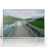 Acrylic print of New Brunswick scenery in art deco style, with muted earth tones, framed in white.