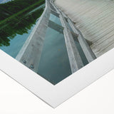 Art deco poster of New Brunswick scenery in muted green and blue tones on rolled canvas, suitable for dining room wall art.