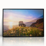 Large abstract wall art of a Newfoundland coastline in muted gray and blue tones, framed in black acrylic.