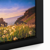 Close-up of a textured black wall art featuring a vibrant Newfoundland scenery on a framed canvas.