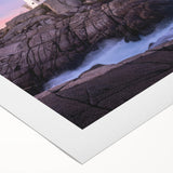 Art deco poster of Nova Scotia scenery on rolled canvas, featuring muted blue and green tones.