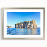 Textured abstract art print of Quebec scenery in muted earth tones, framed with a silver mat, suitable for bedroom decor.