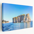 Side view of a stretched canvas featuring a serene Quebec landscape in soft blue and green tones.