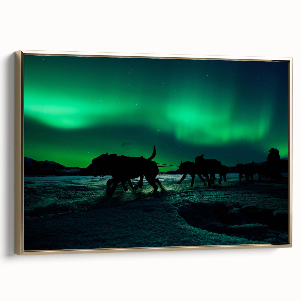 Framed canvas featuring a vintage-style landscape painting of the Yukon, with muted gold and black tones.