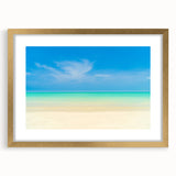 Abstract art print of Caribbean scenery in gold frame, featuring serene blue and green tones, ideal for dining room decor.