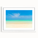 Textured abstract art print depicting a serene Caribbean scene in muted blue and green tones, framed with a white mat.