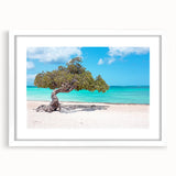 Textured abstract art print of Caribbean scenery in muted blues and greens, framed in white, ideal for bedroom art.