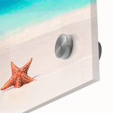 Mid-century modernist acrylic print of a Caribbean beach scene in muted blues and greens, ideal for dining room art.