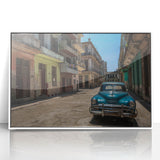 Mid-century modernist art depicting a Caribbean landscape in muted blues and greens on a framed acrylic print.