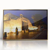 Mid-century modernist art depicting a Caribbean scenery in gold and blue tones on a framed acrylic.