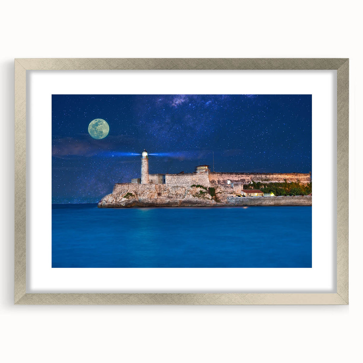 Extra large abstract art print of Caribbean scenery in muted blue and green tones, framed in silver.