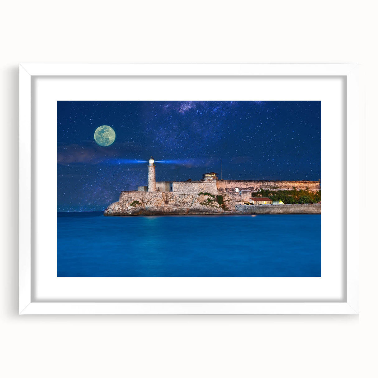 Textured abstract art print of Caribbean scenery in muted blue and green tones on a white framed mat, ideal for bedroom art.