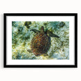 Abstract art print featuring vibrant, colorful scenery of Saint Vincent in a large black frame, ideal for living room decor.