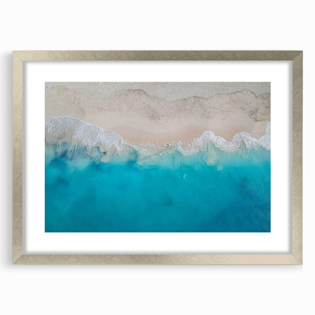Extra large abstract art print featuring textured Caribbean scenery in cool blue and green shades, framed in silver.
