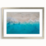 Extra large abstract art print featuring textured Caribbean scenery in cool blue and green shades, framed in silver.