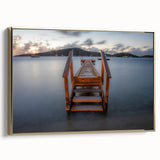 Framed canvas wall art depicting a serene Caribbean landscape in muted blue and green tones, ideal for bedroom decor.