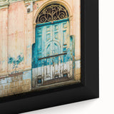 Extra large black wall art featuring a textured, colorful Central American scenery on framed canvas.