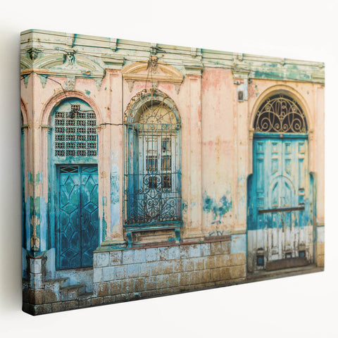 Side view of a stretched canvas depicting a Central American rural landscape in muted earth tones.