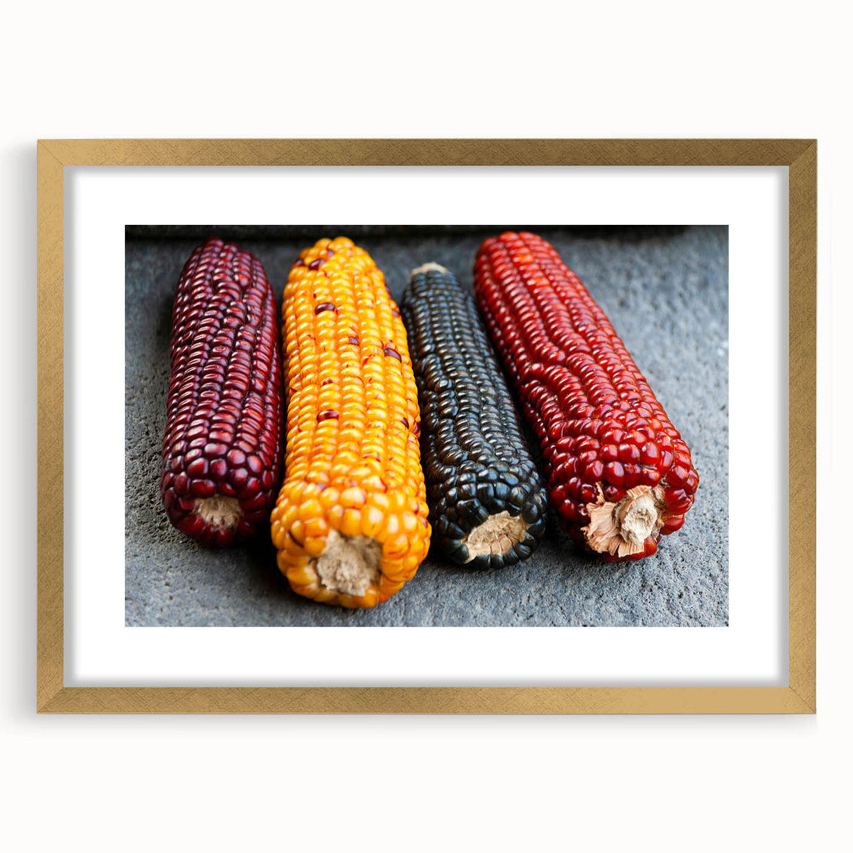 Extra large abstract art print depicting a textured Central American landscape in muted earth tones, framed in gold.