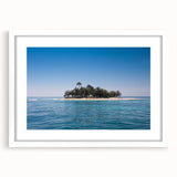 Abstract art print of a Central American scenery in muted earth tones, framed with a white mat.