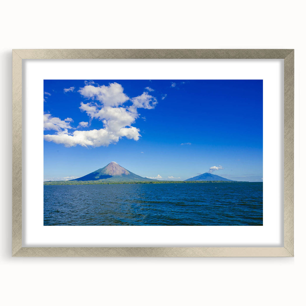 Textured abstract art print of a Central American scenery in silver frame, ideal for bedroom art.