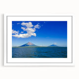 Abstract art print of Central America scenery in muted earth tones on a white framed canvas, ideal for dining room decor.