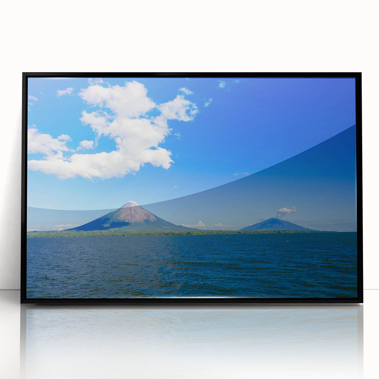 Large abstract wall art depicting a Nicaraguan landscape in vibrant colors on a black framed acrylic.