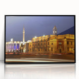 Large abstract wall art depicting a stylized European scenery in muted tones on a framed acrylic.