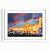 Textured abstract art print of a European scenery in muted earth tones, framed with a white mat, suitable for bedroom art.