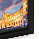 Extra large framed canvas featuring a textured depiction of a European scenery in black with colorful accents.