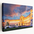 Panoramic view of an Austrian landscape on a large stretched canvas, featuring muted green and blue tones.