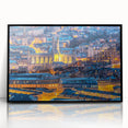 Large abstract wall art depicting a European cityscape in muted gray and blue tones, framed in black acrylic.