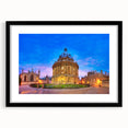 Abstract art print of Oxford scenery in vibrant colors on a large textured canvas, framed in black.