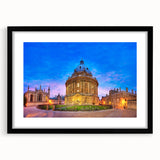Abstract art print of Oxford scenery in vibrant colors on a large textured canvas, framed in black.