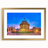Abstract art print of Oxford scenery in muted earth tones, framed with a gold mat, ideal for dining room decor.