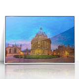 Mid-century modernist art of Oxford scenery in muted colors on a white framed acrylic, ideal for nursery wall decor.