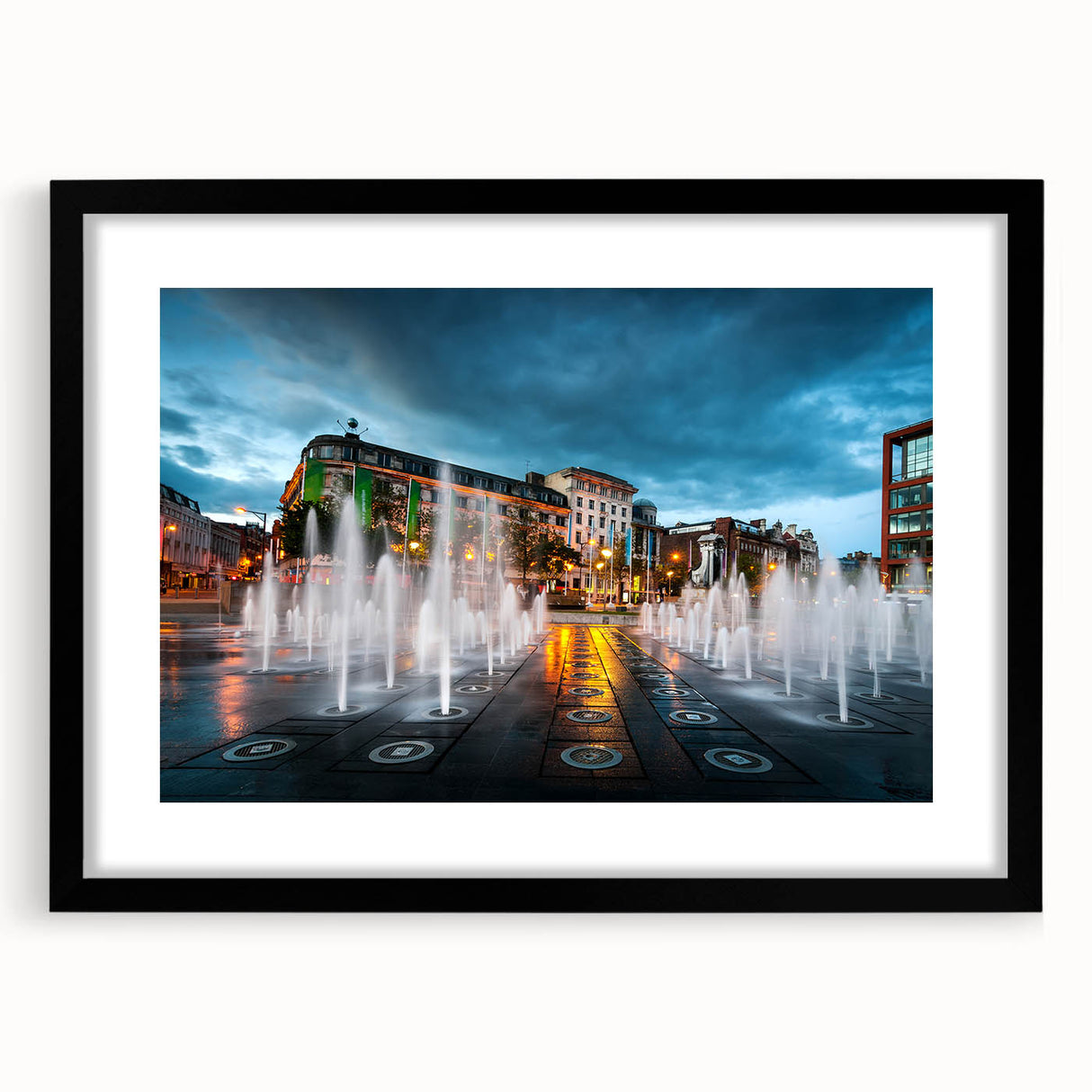 Abstract art print of Piccadilly, England in vibrant colors on a textured, extra large canvas, framed in black.