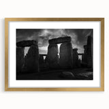 Abstract art print of Stonehenge in muted earth tones on a framed canvas, suitable for bedroom or dining room decor.