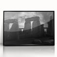 Large abstract wall art of Stonehenge in muted gray and black tones, acrylic print framed in black.