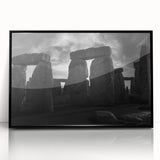 Large abstract wall art of Stonehenge in muted gray and black tones, acrylic print framed in black.