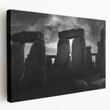 Side view of a stretched canvas featuring a realistic depiction of Stonehenge in muted earth tones.