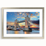 Extra large abstract art print of the Thames River in vibrant colors on a textured canvas, framed in silver.